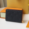 Louis Vuitton’s Signature Monogram Motif Cléa Wallet – Black